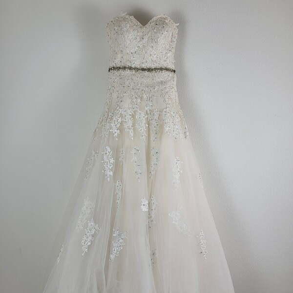 Strapless trouwjurk offwhite kant/pailletten